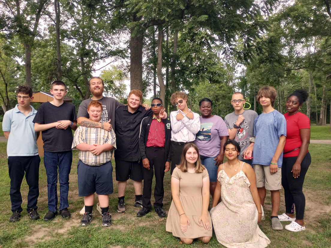 One of the cabin groups take a picture during the overnight summer camp at the Fowler Center