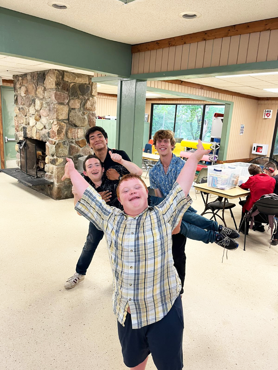 a group of campers pose for a picture together